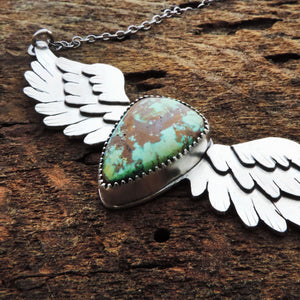 artisan angel wing pendant