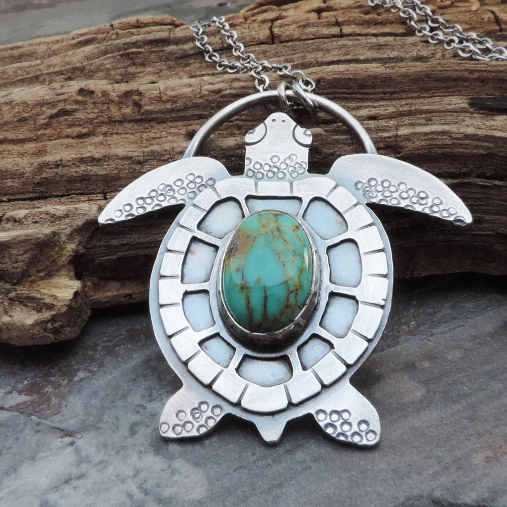 handmade sea turtle pendant with turquoise stone