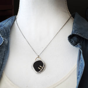 Black Sea Glass Pendant with Double Brass Prongs