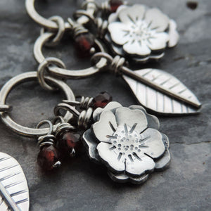 Flower Garden Charm Bracelet Accented with Red Garnet