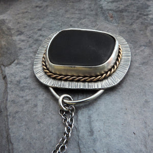 black sea glass pendant