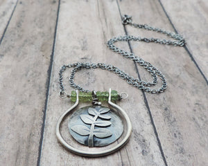handmade silver fern plant necklace peridot gemstones