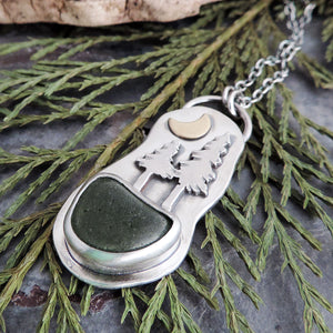 green sea glass necklace with pine trees