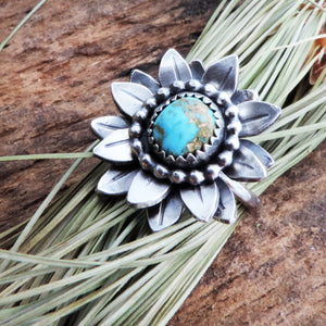 silver flower ring with turquoise center