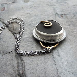 Black Sea Glass Pendant with Brass Prong Swirl