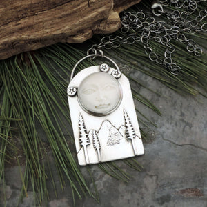 Moon Face Over Mountains and Pine Trees Necklace