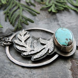 handmade silver fern pendant with turquoise stone