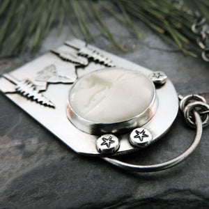 Moon Face Over Mountains and Pine Trees Necklace