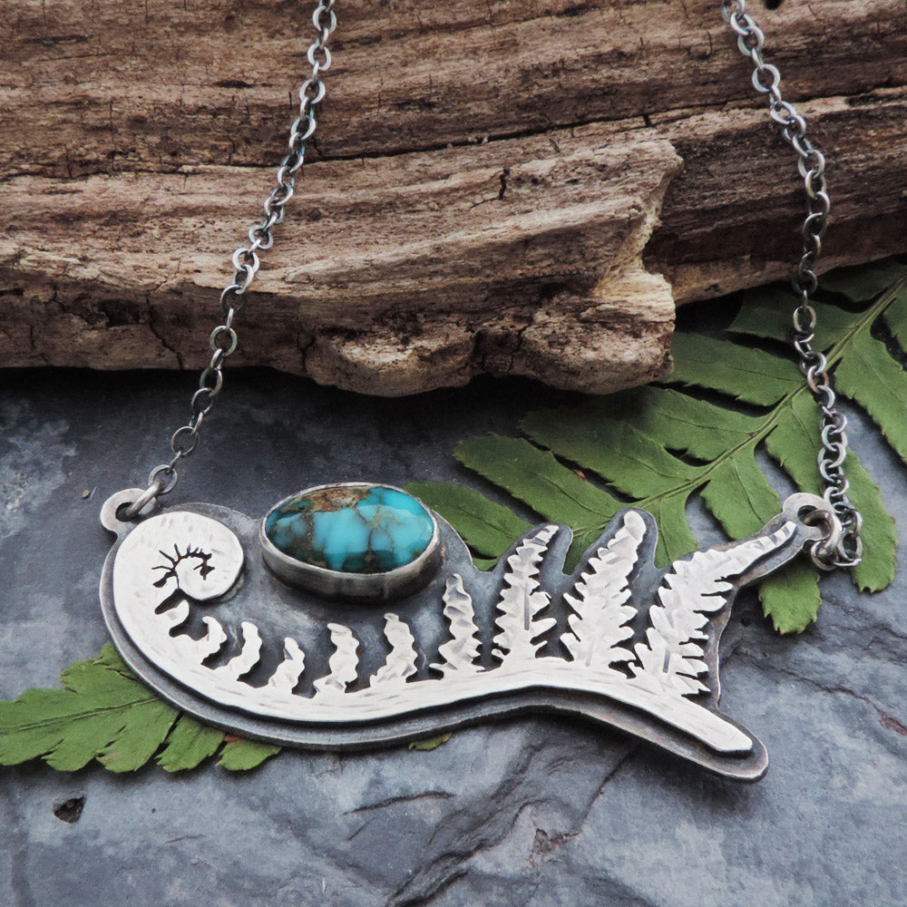 sterling silver unfurling fern frond necklace with turquoise stone