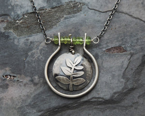 nature inspired silver botanical pendant