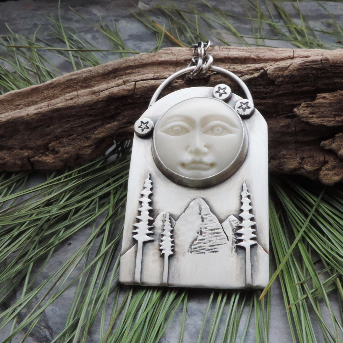 Moon Face Over Mountains and Pine Trees Necklace